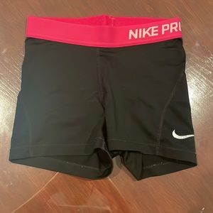TWO adult xs NIKE pro shorts